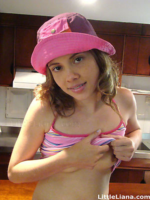 Watch her get out of her icky clothes and play with her pink teen body on 